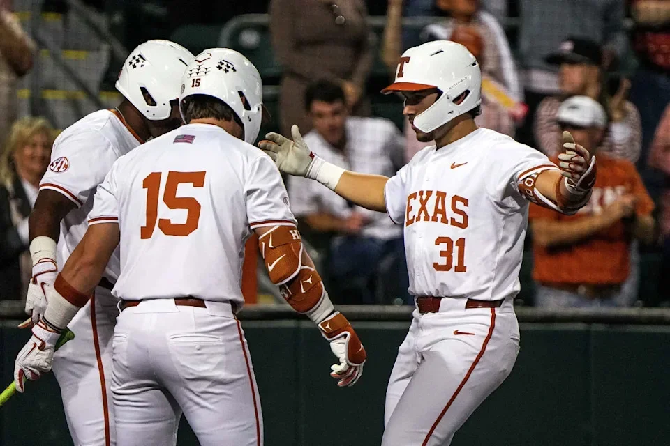 The Texas Longhorns celebrate a home run by infielder Casey Borba (31) during the game against Ole Miss at UFCU Disch-Falk Field on Friday, March 13, 2026 in Austin. (Aaron E. Martinez/Austin American-Statesman)